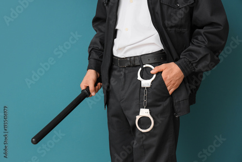 Male police officer with ha...