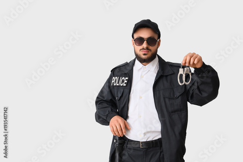 Male police officer in sung...