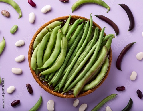 Top view of many various beans. Green beans, french beans, beans, adzuki beans on pale lilac background