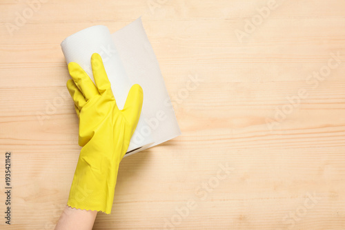 Female hand in rubber glove...