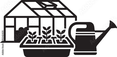 Greenhouse gardening with watering can and young plants growing