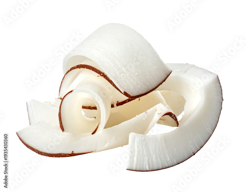 Thin, curved white coconut shavings with brown edges arranged in a spiral