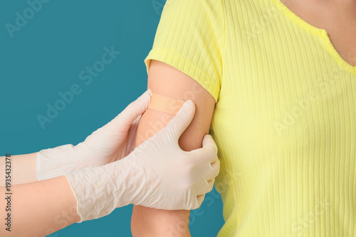 Doctor applying medical pat...