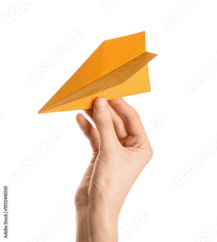 Female hand with yellow pap...