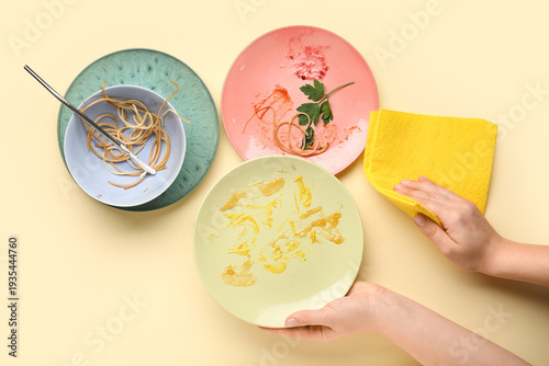 Female hands with rag and m...
