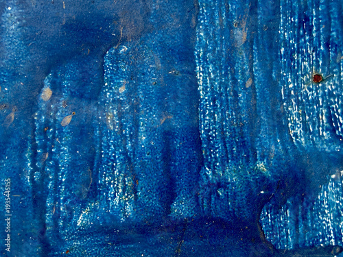 A blue background with a blue brush stroke