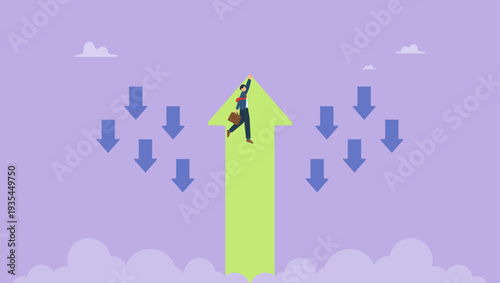Businessman hold rising green arrow go different way from group of blue. Business and finance concept.