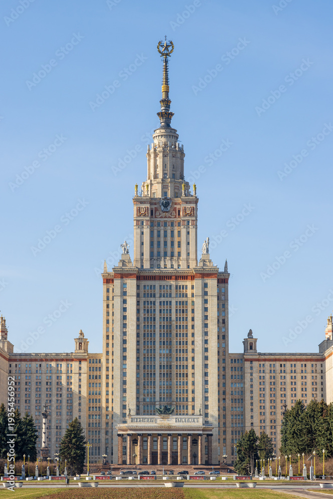 Obraz premium View of the main building of Moscow State University. A beautiful high-rise building with a spire. Architectural dominant and landmark of Moscow. Vorobyovy Gory, Moscow. Higher education in Russia.