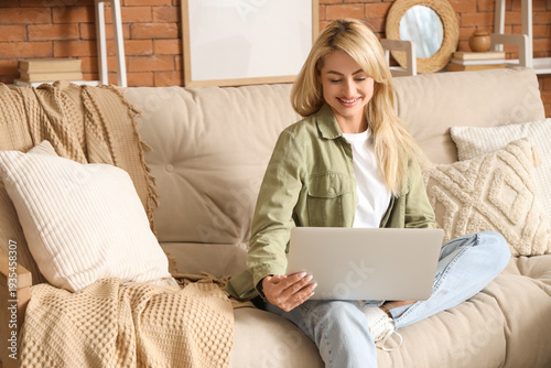 Beautiful woman with laptop...