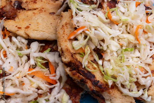 Delicious pupusas with fresh coleslaw and savory fillings