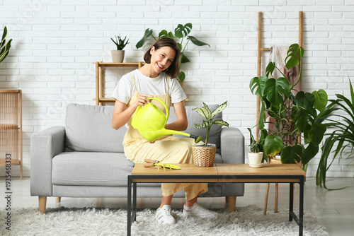 Smiling young woman sitting...
