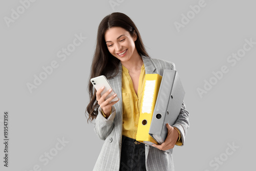 Beautiful businesswoman wit...