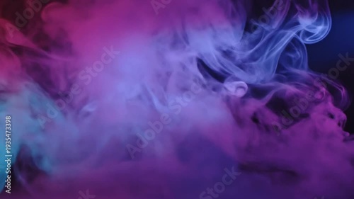 Abstract purple smoke illuminated by colored lights, mysterious atmosphere