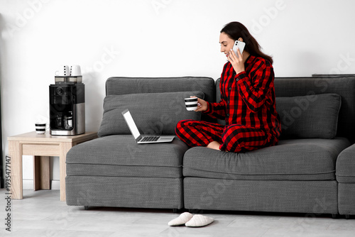 Young businesswoman with co...