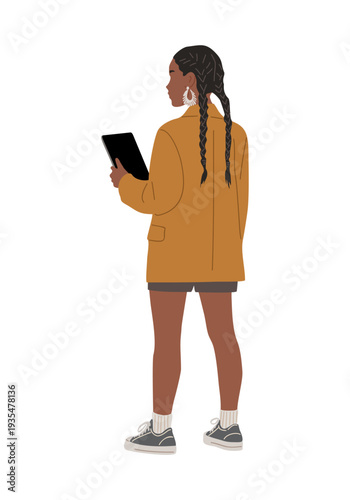 Flat illustration of a dark-skinned woman seen from behind, wearing oversized mustard jacket and braids, holding a tablet, isolated on transparent background.