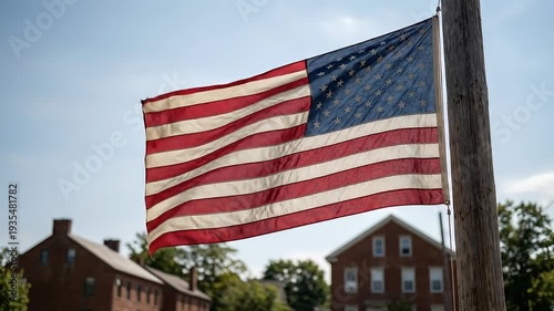 American Flag Waving in Front of Historic Buildings.