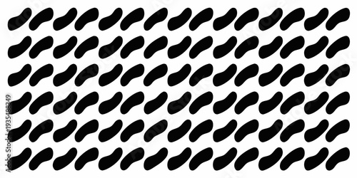 Abstract pattern of black pebble like shapes on a white background
