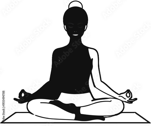 A silhouette of a person in a meditative pose on a mat