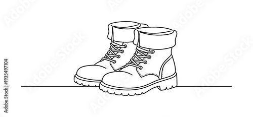 Classic lace up boots detailed line art illustration symbolizing workwear, hiking and durable footwear concept