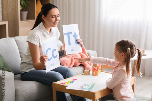 Female speech therapist wit...