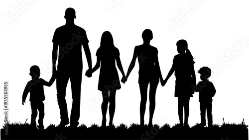 Family holding hands in a line on grassy field