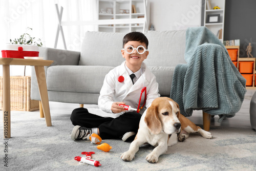 Cute little doctor with toy...