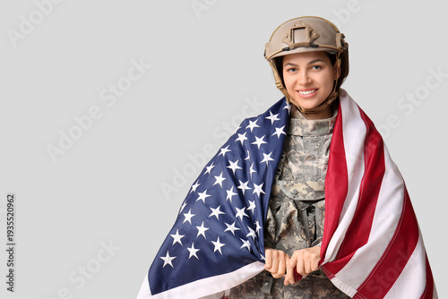 Female soldier with USA fla...