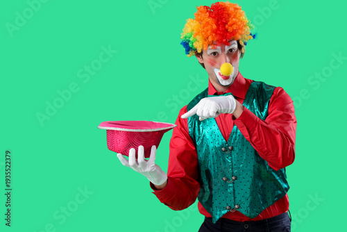 Portrait of clown pointing ...