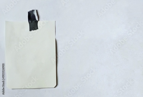 Blank sticky note mockup with tape isolated on white