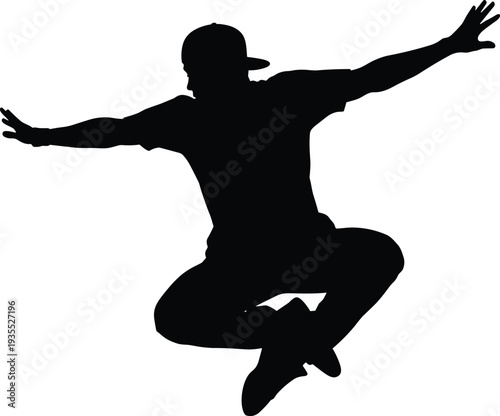 Black silhouette of a male hip hop dancer jumping in mid air wearing a cap and sneakers isolated on white