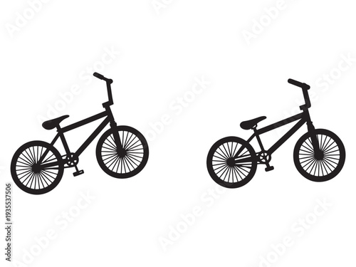 Two black bicycles with thin tires and straight handlebars facing opposite directions on white background  bike silhouettes