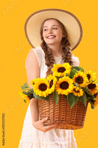 Young woman with basket of ...