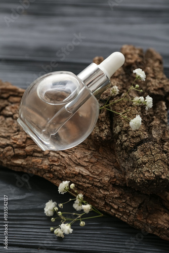 Bottle of essential oil, tr...