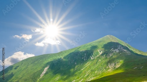 Hoverla mount top  under a sparkle sun time lapse scene