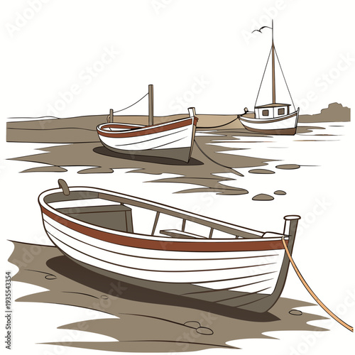 Boats on a sandy beach tied up sandy shore white and brown
