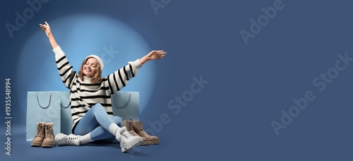Happy young woman with wint...