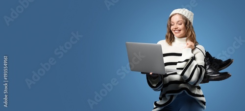 Stylish young woman with la...