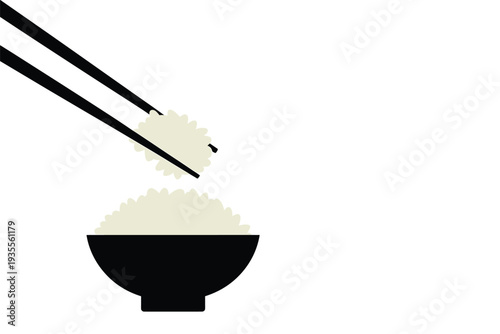 Chopsticks picking up sushi rice over a bowl