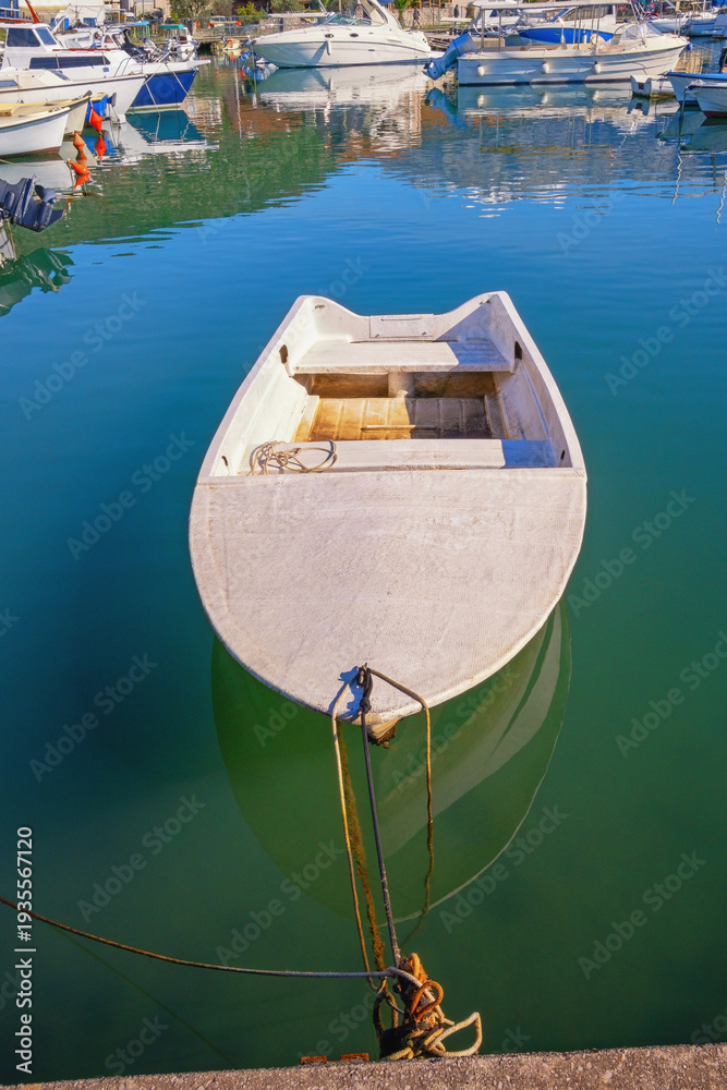 Fototapeta premium Fishing boat at the pier. Montenegro, Bay of Kotor. Tivat, Kalimanj Marina