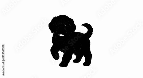 Black silhouette of a playful, fluffy puppy with a curled tail
