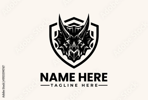 Free Download A black and white illustration of a shield with a dragon's head and the words 'NAME HERE' and 'TAGLINE HERE' on a beige background, featuring a logo, vector, illustration, icon, and - GFXLoad