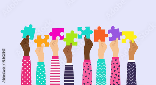 Diverse hands holding puzzle pieces together in unity and cooperation.