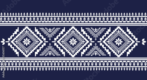 Traditional geometric pattern with diamond shapes and floral motifs.