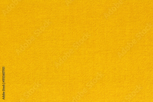 Yellow gold cotton fabric cloth texture for background, natural textile pattern.