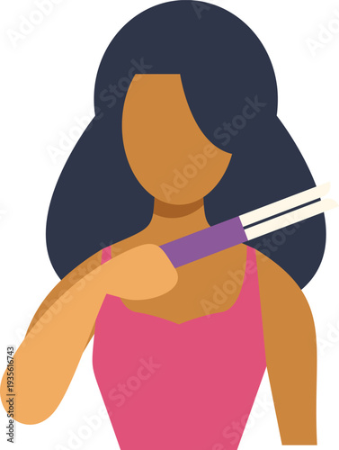 Woman styling her long dark hair using a hair straightener