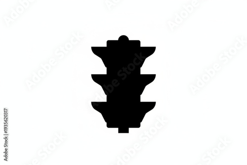 Traffic Light Silhouette: A simple silhouette of a traffic light, conveying the universal language of road safety and direction.