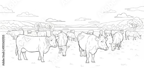 A serene pasture scene with several cows grazing under a cloudy sky