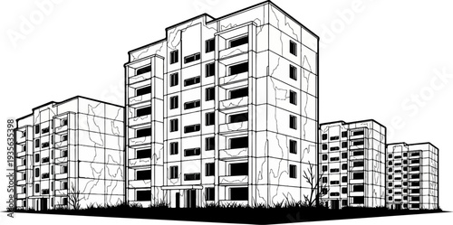 Dilapidated apartment buildings stand tall in an overgrown field