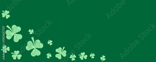 green st patrick day background with clover leaves in corner