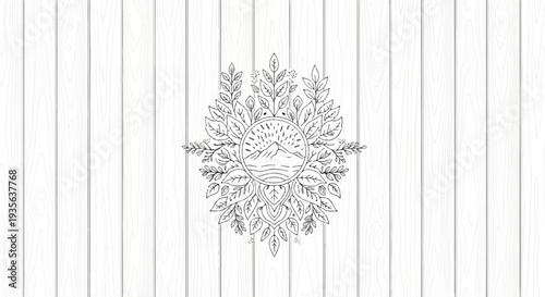 Ornate circular design with sun, mountains, and foliage on wood grain